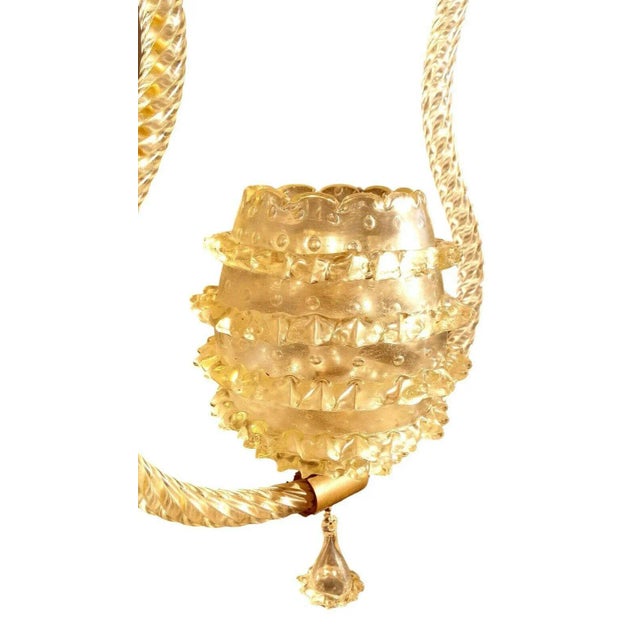 original chandelier 50 years production and design of ercole barovier, made of glass with Murano beaked single central...