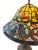 A beautifully crafted stained glass table lamp inspired by the timeless artistry of Tiffany Studios and the Art Nouveau...
