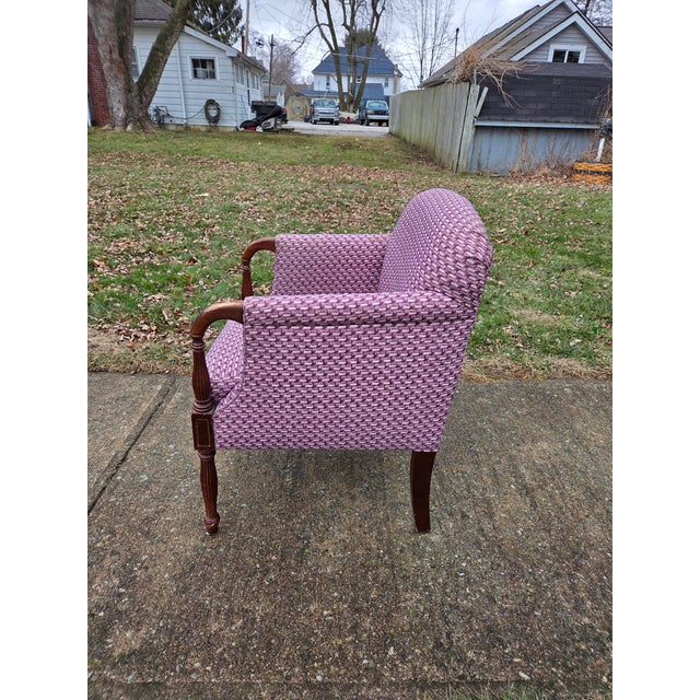 Provenance & Design: This elegant armchair is a confirmed authentic piece by the esteemed American of Martinsville, as...