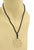 This lovely authentic pendant and black cord necklace is from Tiffany & Co. by designer Paloma Picasso from her Zellige...