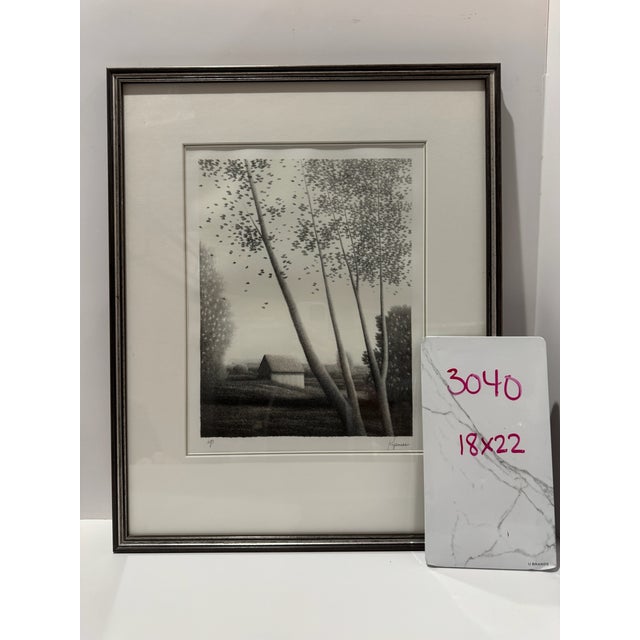 Atmospheric black-and-white landscape print by American artist Robert Kipniss, depicting slender trees framing a small...