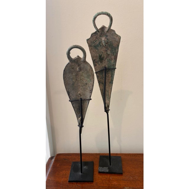 Great pair of 12th century bronze Khmer horse ornaments on custom stands. Measures 11” and 10” tall by 2” wide. Decorative...