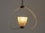 Pendant lamp Bulicante glass structure, brass details. This piece is attributed to the mentioned designer/maker. It has no...
