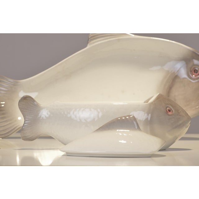 This highly decorative fish service by Adolph Müller was first produced by the Wächtersbach stoneware factory in 1901. It...