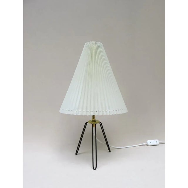 A minimalist table lamp "String" from the 60s with the original pleated screen made of plastic. The stand of the luminaire...