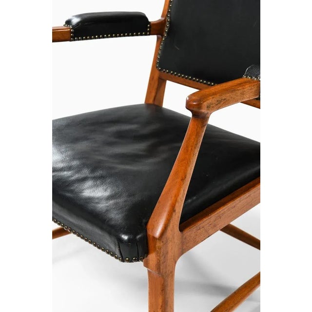 Rare pair of armchairs designed by Erik Chambert. Produced by Chamberts möbelfabriker in Norrköping, Sweden. Wear...