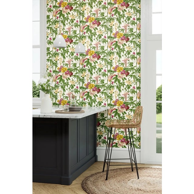 Inspired by a wallpaper from the archive Japanese influences feature in this surface printed design that retains a hand...