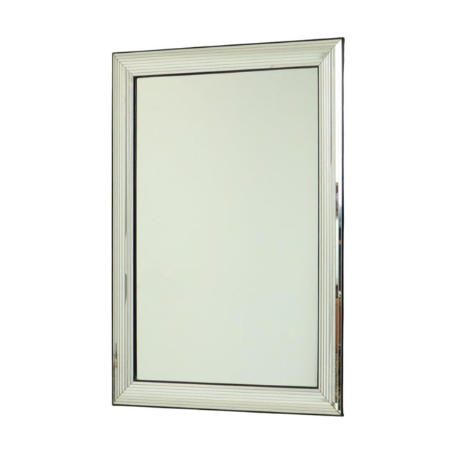 Fantastic Hollywood Regency mirror, silver-colored with black details, by Deknudt, 1970s-1980s, marked on the back with...
