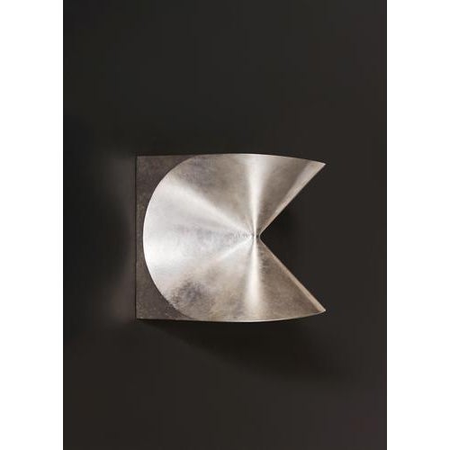 Cono sconce in silvered bronze by farrah sit. Dimensions: w 16.5 x d 16.5 x h 16.5 cm. Materials: silvered bronze. All our...