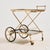 A French Maison Jansen brass-framed trolley with glass shelves and four wheels from the 1960s. A truly multifunctional...