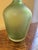 Venini bottle made of Murano glass, green Height: 26 cm, Diameter: 16 cm In good, used condition This piece has an...