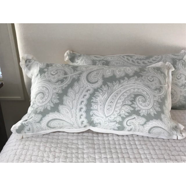 Pr of light green linen pillows with ruffled flange border. White linen backs. Hidden zipper with feather/down inserts....