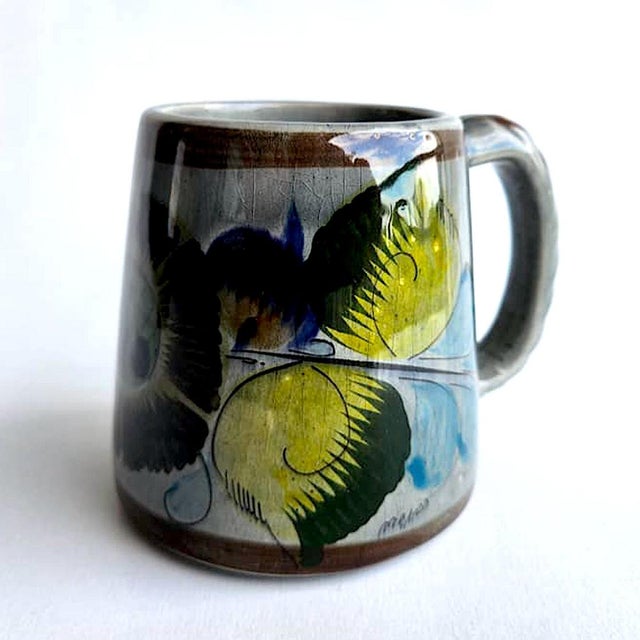 Offered is a vintage late 1970s ceramic gray floral motif mug from Tonalá in Jalisco, Mexico and created by Ken Edwards...