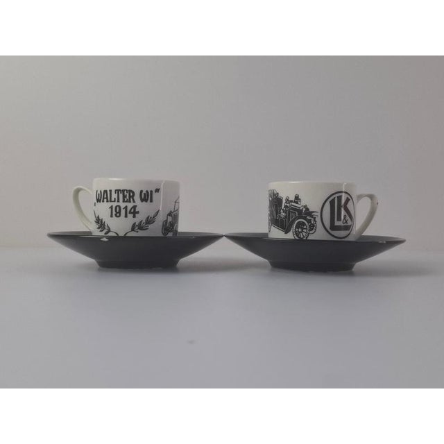 A midcentury porcelain cup and saucer set manufactured by Ditmar Urbach in former Czechoslovakia. The pair features crisp...