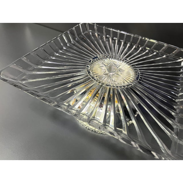 Elevate your table setting with this stunning handmade cake stand, featuring a solid brass base and a striped etched glass...