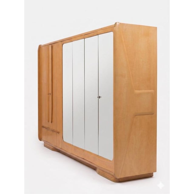 This refined mid-century modern cabinet, designed by vittorio dassi for "la permanente mobili cantù" in the 1950s, is an...