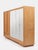 This refined mid-century modern cabinet, designed by vittorio dassi for "la permanente mobili cantù" in the 1950s, is an...