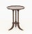 American Empire Style Mahogany Tripod Table, the shaped floriform top above three fluted legs terminating in brass lion's...