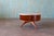 A custom Vladimir Kagan (American, 1927-2016) for Kagan-Dreyfuss, Inc. Marble and cherry rotating round coffee table,...