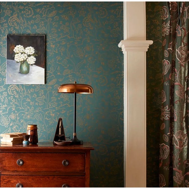 This attractive and whimsical Morris & Co. wallpaper is inspired by the characters on a quilt embroidered by May Morris in...