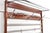 Beautiful large wall coat rack from the 1960s. The mahogany coat rack has many hooks for hanging coats and children's...
