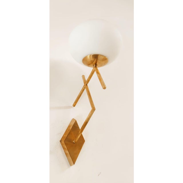 Brass Wall Light with Oval Glass, in Flawless conditions. Designed 1970 to 1979 Up to 250V (Europe/UK Standard).The wiring...