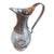 An elegant Italian pewter and glass pitcher by MATCH, renowned for its beautifully handcrafted luxury tabletop...