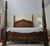 The Verona Eastern King Poster Bed commands attention with its burlwood inlaid headboard and regal silhouette, making it...