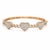 Romantic with a modern edge, this 10K Rose Gold bangle bracelet features a heart-inspired design set with round and...