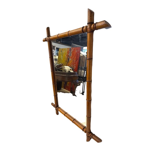 This extra large faux bamboo mirror was sourced in France with what appears to be the original glass. Carved from hardwood...