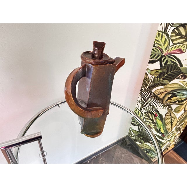 Joe Winter is a contemporary ceramicist who lives and works in Reno, Nevada. Very good condition This piece has an...