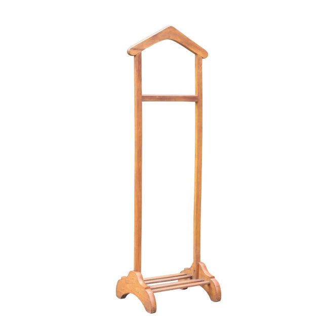 Sculptural men's valet stand from the 1960s, made of solid beech wood. The round, curved hanger at the top is intended for...