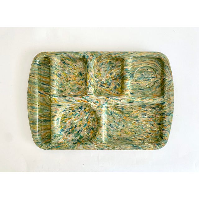 A nostalgic cross between carnival "spin art" and the cafeteria lady, these Melamine divided trays in an assortment of...