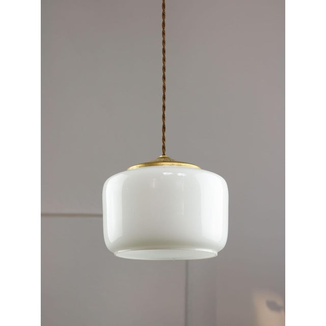 Lamp's cover is made of genuine brass material complementing this vintage item nicely with it's golden colour. total...