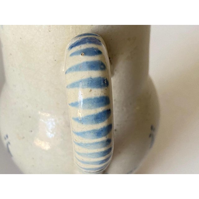 This Jug has a great old Patina. It is from France made in the 18th Century. The material is Pottery and the condtion is...