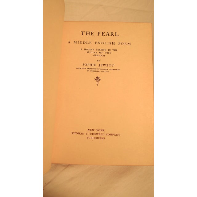 Offered is an early 20th century decorative leather book, a translation that Jewett undertook, a version of the complex...