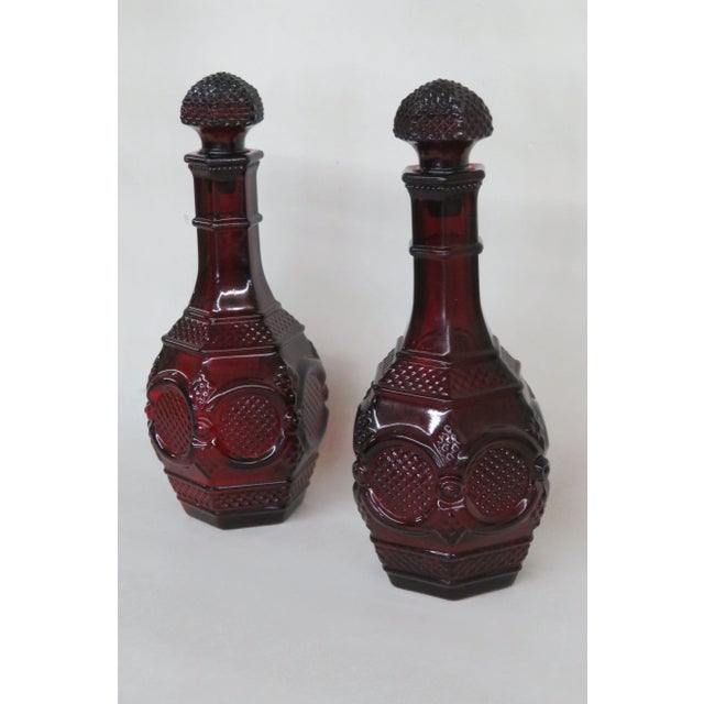 This lovely glass Decanters were made by Avon as part of their Cape Cod Collection, and it is labeled on one of them, and...