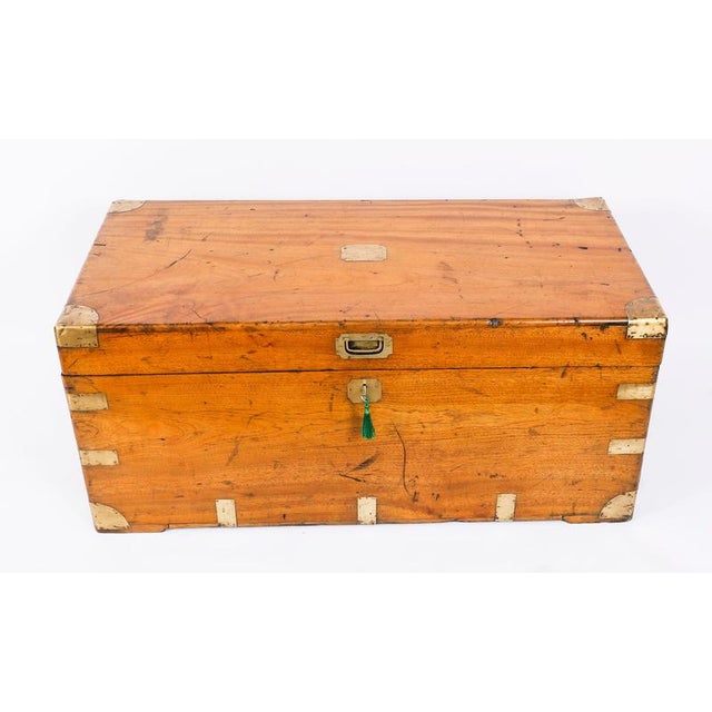 This is beautifully crafted antique late Victorian camphorwood military campaign trunk or coffer, ideal for use as a...