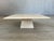 Dimensions: H 16.4” x W 39” x D 39” Mid-Century Modern Travertine stone coffee table with square top with beveled edge...