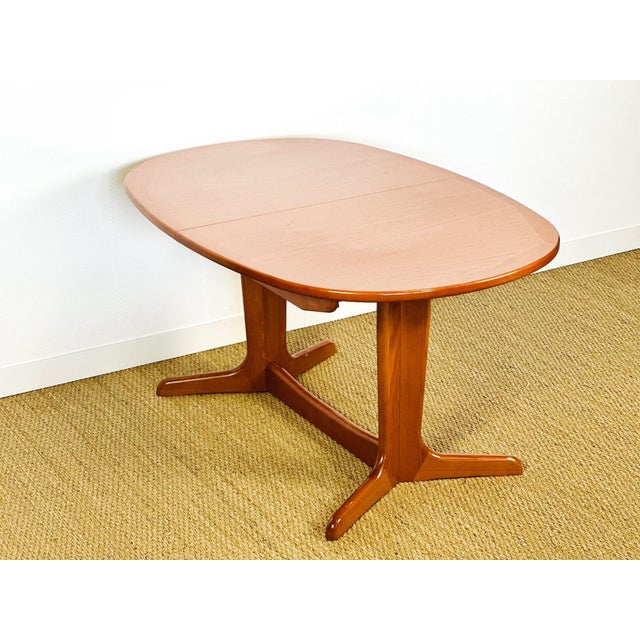 Stunning oval extendable dining table by g plan cabinets, an iconic brand of mid-century british design. crafted entirely...