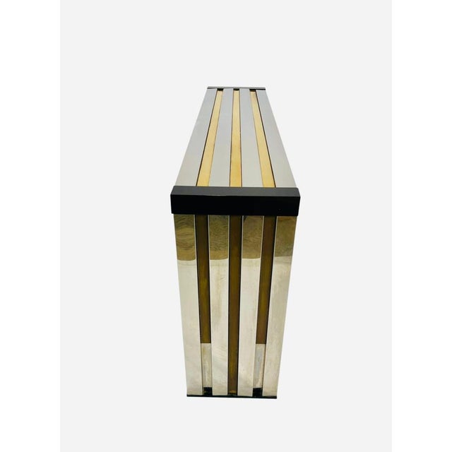 Rare Console by Romeo Rega in Metal chrome and brass with a glass top dimension without glass : 140x30X74cm or...