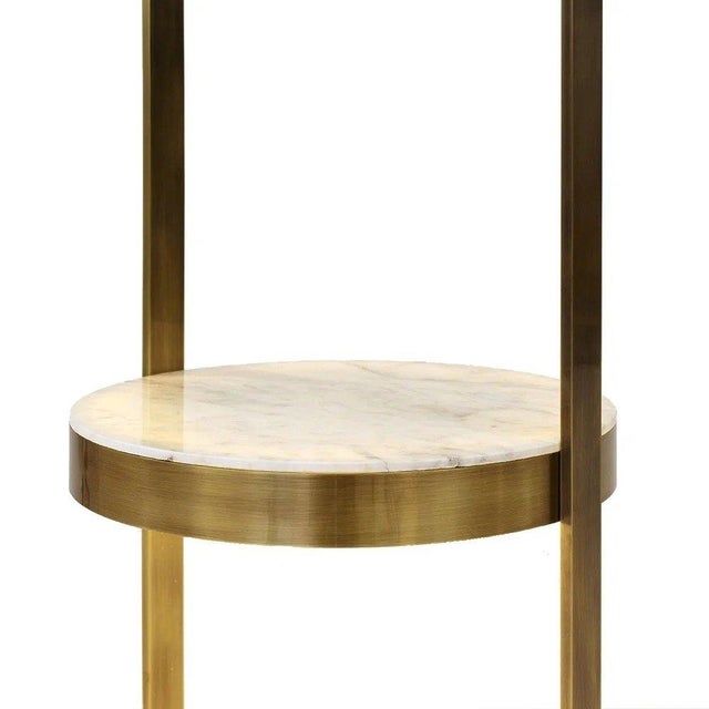 An elegant sculptural Josephine floor lamp, designed by Studio 63 for Marioni as part of the Notorious Collection. The...