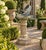 A handsome vintage garden sundial combining a sculptural iron dial with a beautifully weathered cast concrete pedestal....