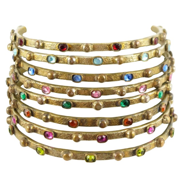 Renowned French jewelry designer Henry Perichon—known simply as "Henry"—crafted this breathtaking set of eight spacer...