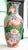 Vintage Chinese enameled porcelain vase from the 1970s. Features a hard-to-find water lily motif. The vase is hand-painted...