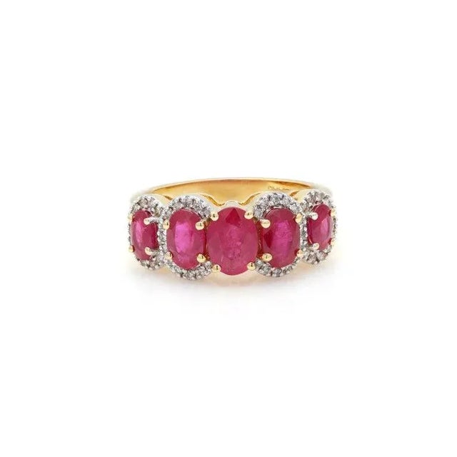 This is part of Chairish’s Fine Jewelry assortment. Ruby and Diamond Engagement Ring in 18K Gold featuring natural ruby of...