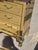 Great looking vintage 1980"s brass Clad chest of drawers with a brown marble top. Unusual claw and ball feet and shell...