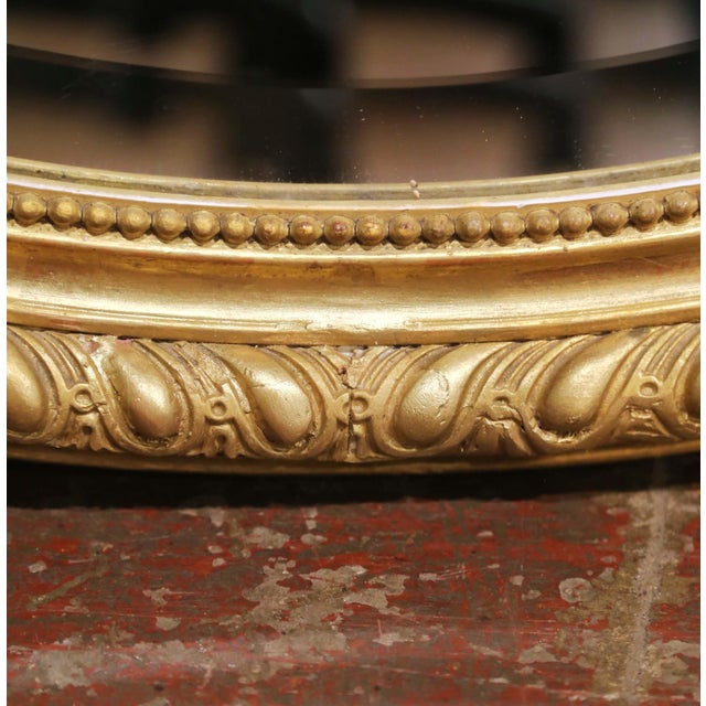 19th Century French Louis XV Oval Giltwood Wall Beveled Mirror With Crest For Sale In Dallas - Image 6 of 7