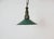 Industrial green enamel pendant light made in Poland during the 1960s. White enamel inside the shade. Green cast aluminium...