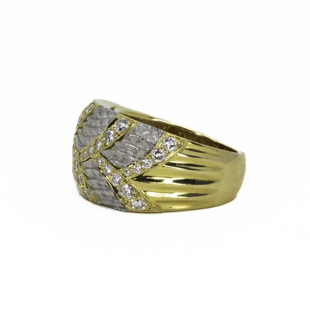 Michael Bondanza 18k & platinum Venti ring with 0.68ctw of EF color VVS clarity round diamonds. 14.25 grams size 6.25